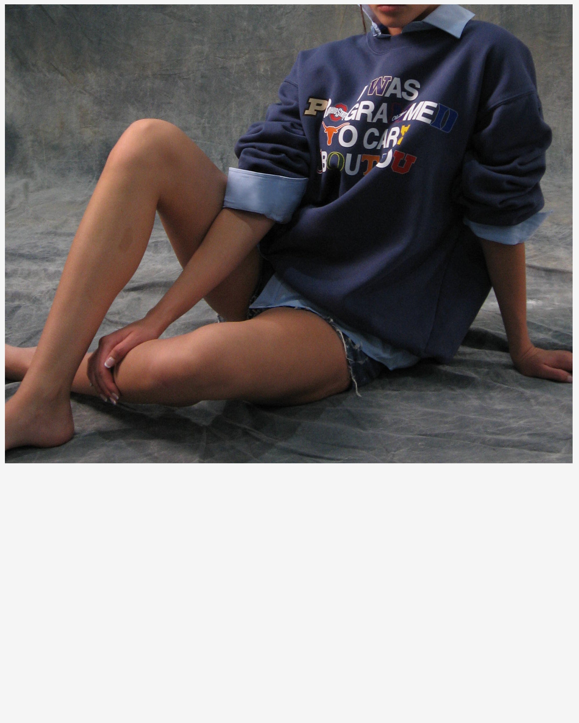"PROGRAMMED TO CARE" COLLEGE CREWNECK SWEATSHIRT