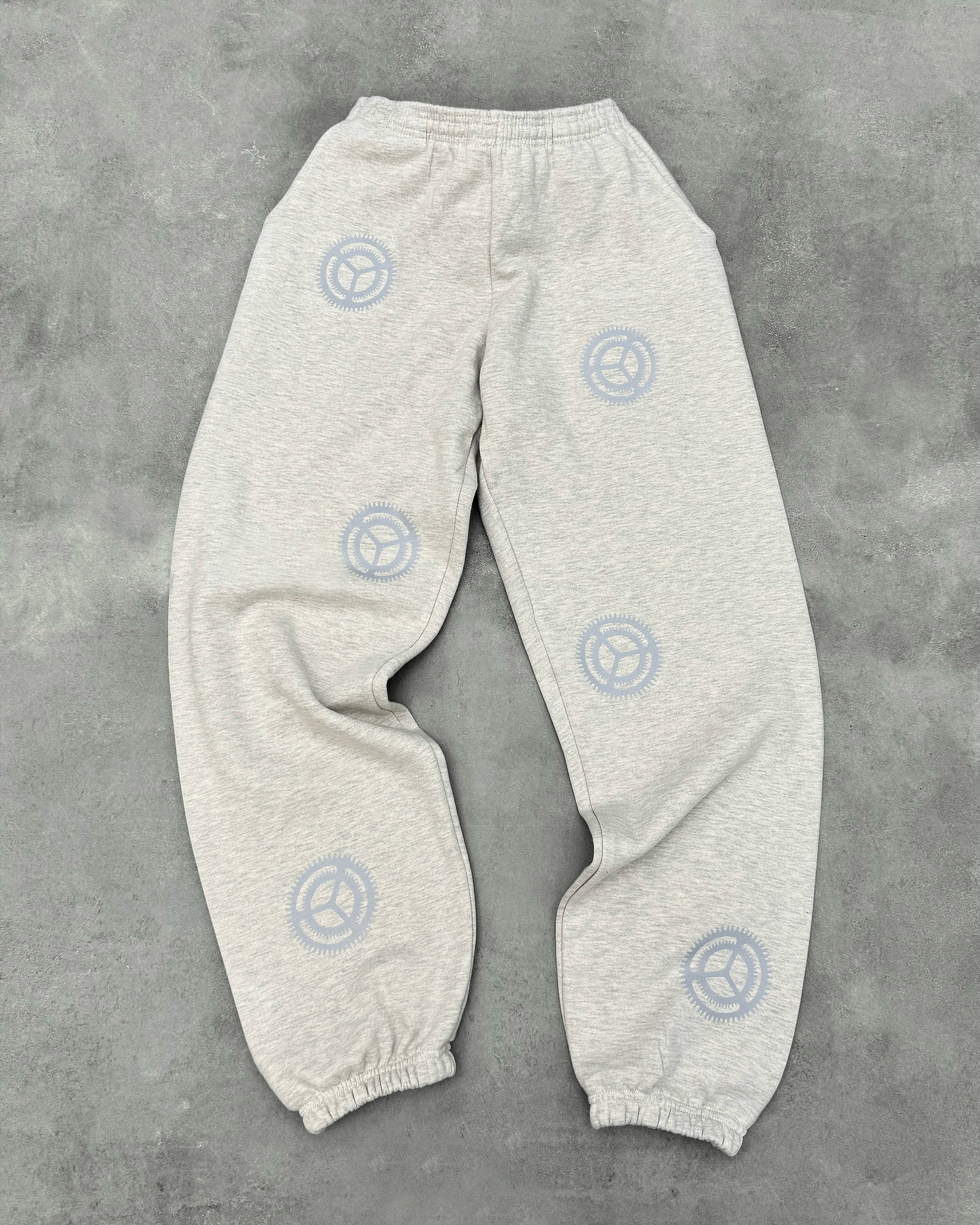 "PROGRAMMED TO CARE" SWEATPANTS
