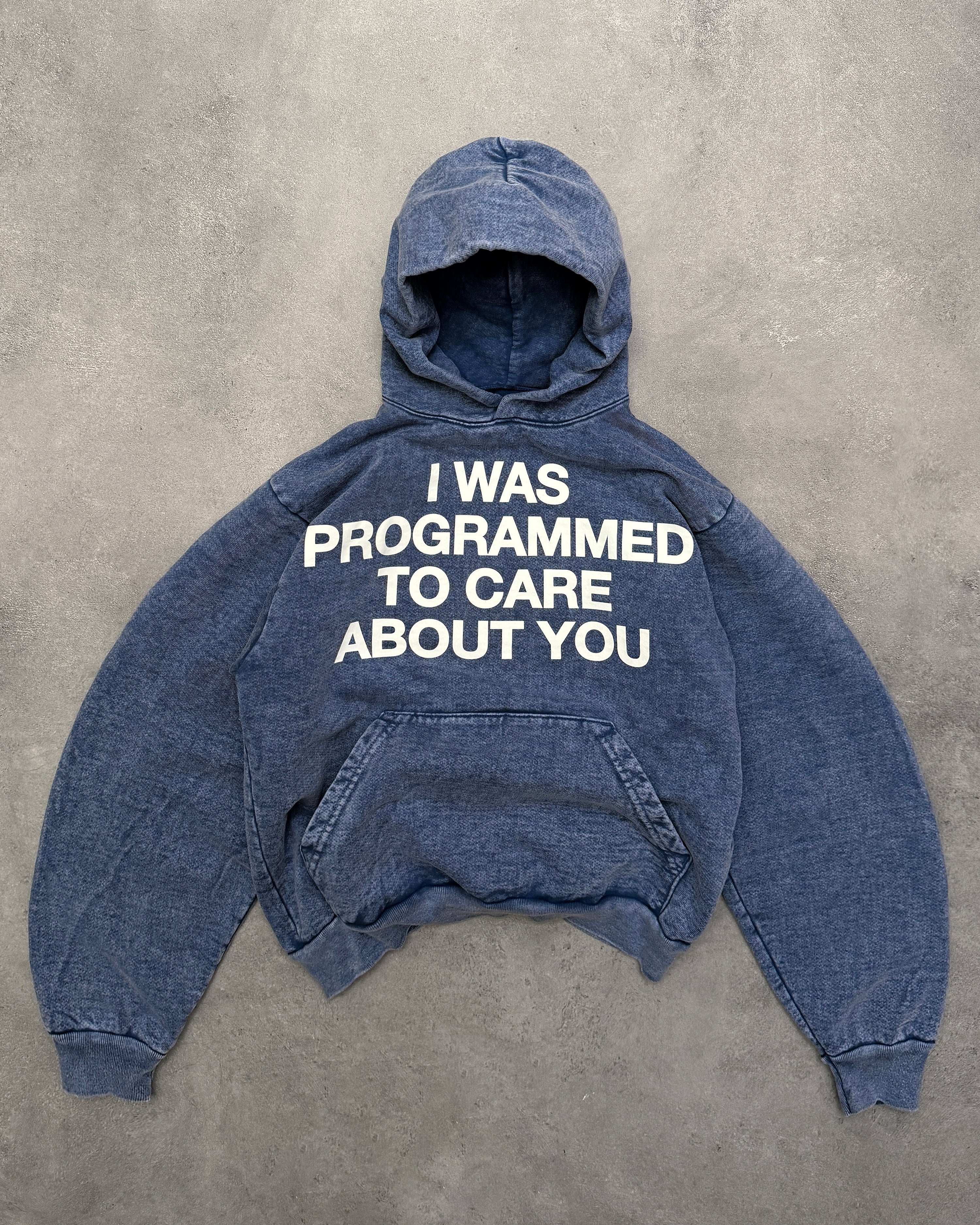 "PROGRAMMED TO CARE" HOODIE