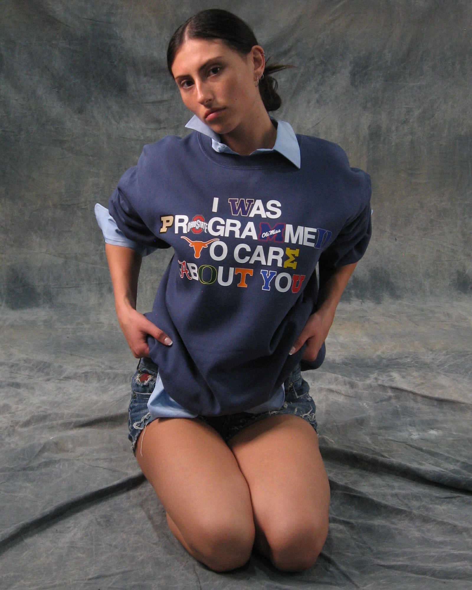 "PROGRAMMED TO CARE" COLLEGE CREWNECK SWEATSHIRT